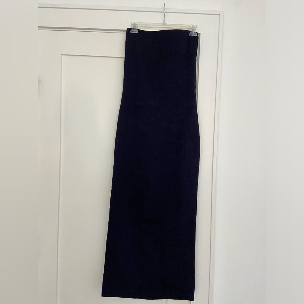 Sculptured strapless dress.